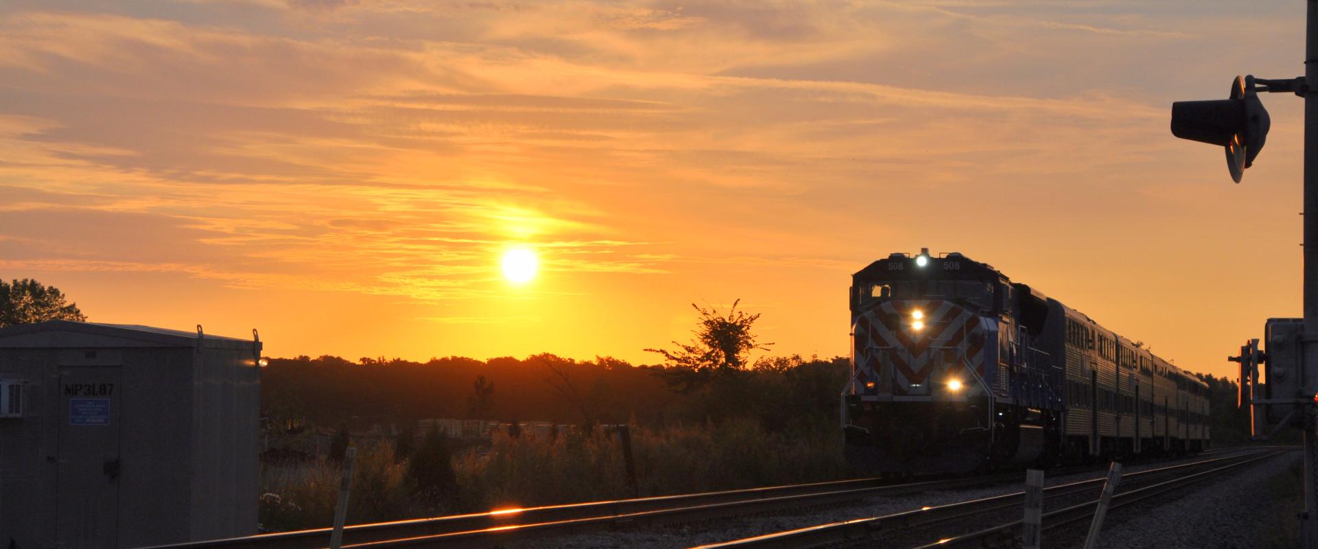 sunrise at a Metra station